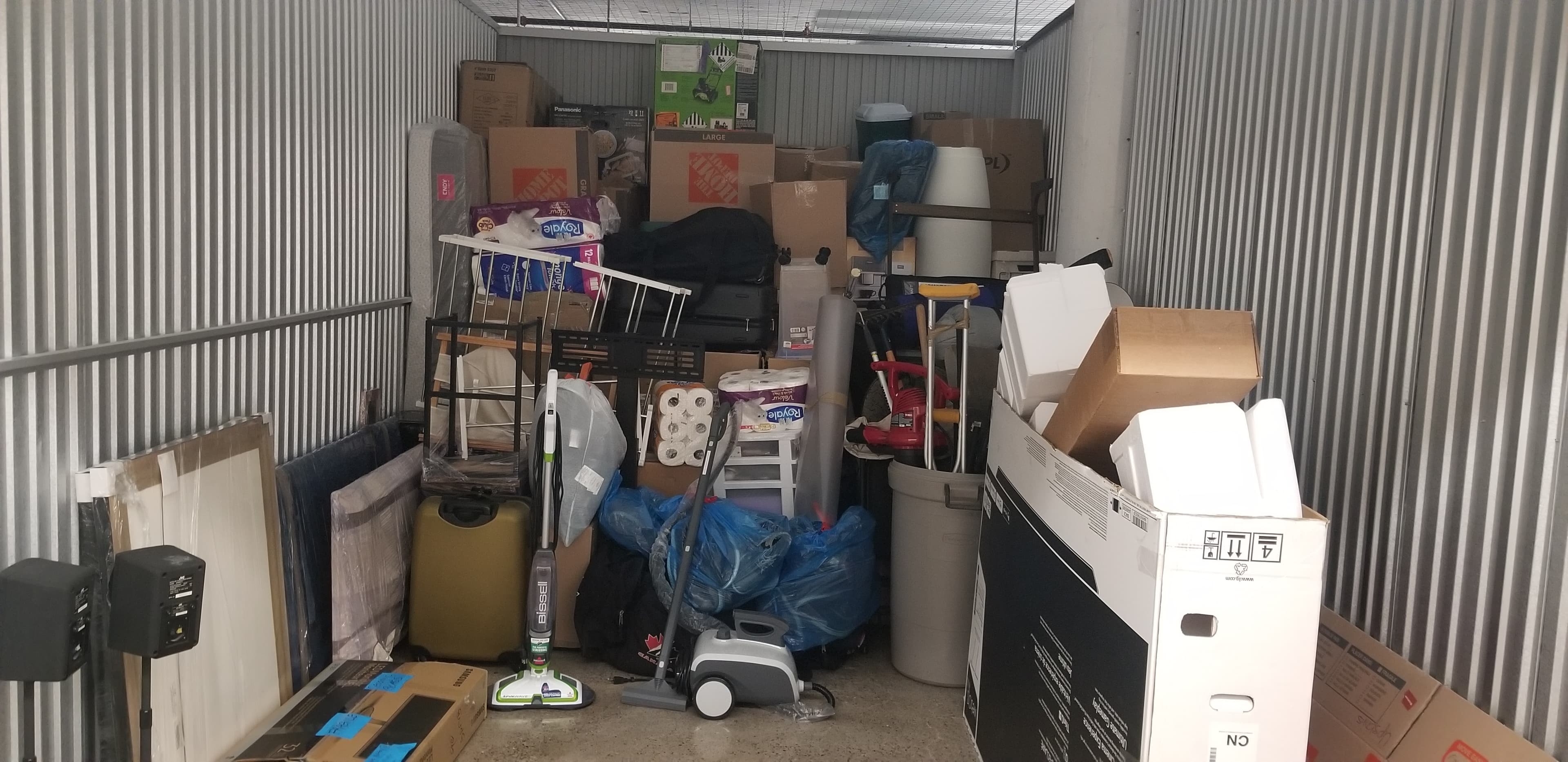 Around Town Moving team removing old furniture and sofas from a residential home in Toronto